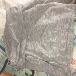 A beautiful grey over the shoulder shirt !